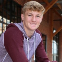 Professional headshot of Alex Hageman